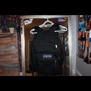 5 pocket black jansport backpack